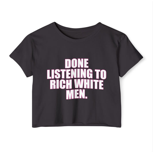 A black crop top with bold pink and white text reading “Done Listening to Rich White Men,” showcasing queer streetwear, activist fashion, and gender-inclusive LGBTQ+ apparel.