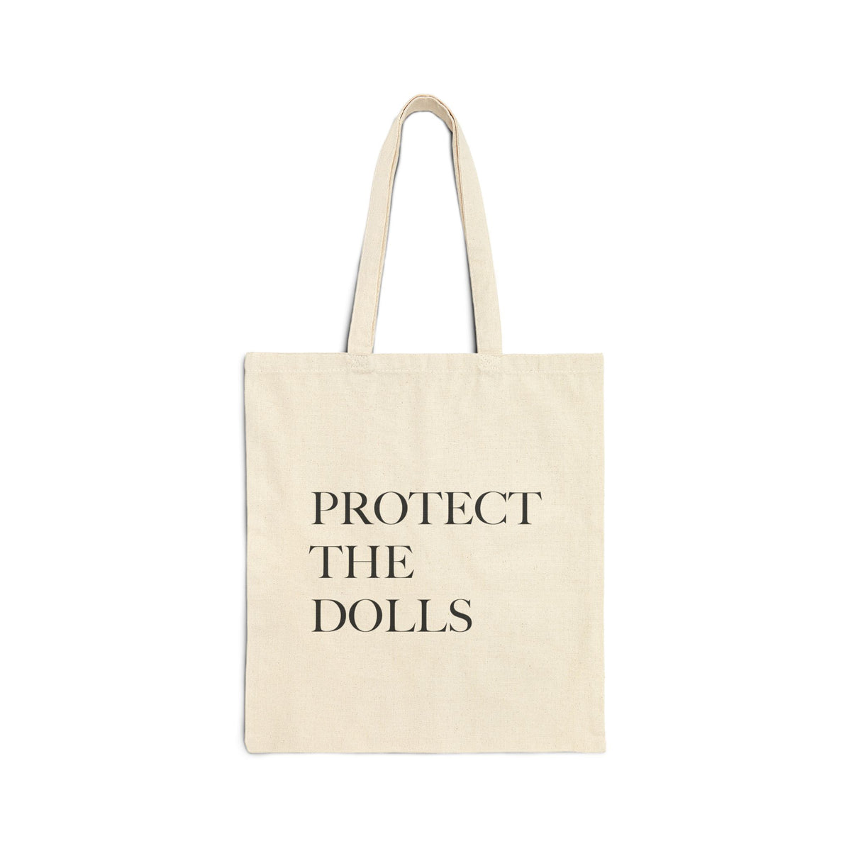 Beige tote bag with 'PROTECT THE DOLLS' text on a white background. The Bayou WeHo in West Hollywood, Los Angeles.