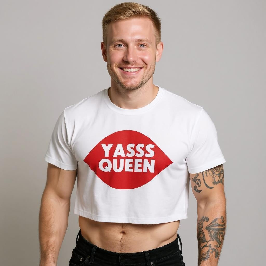 Model wearing a white Yasss Queen crop top with a red lips graphic against a gray background. LGBTQ+ merch from The Bayou WeHo in West Hollywood, Los Angeles.