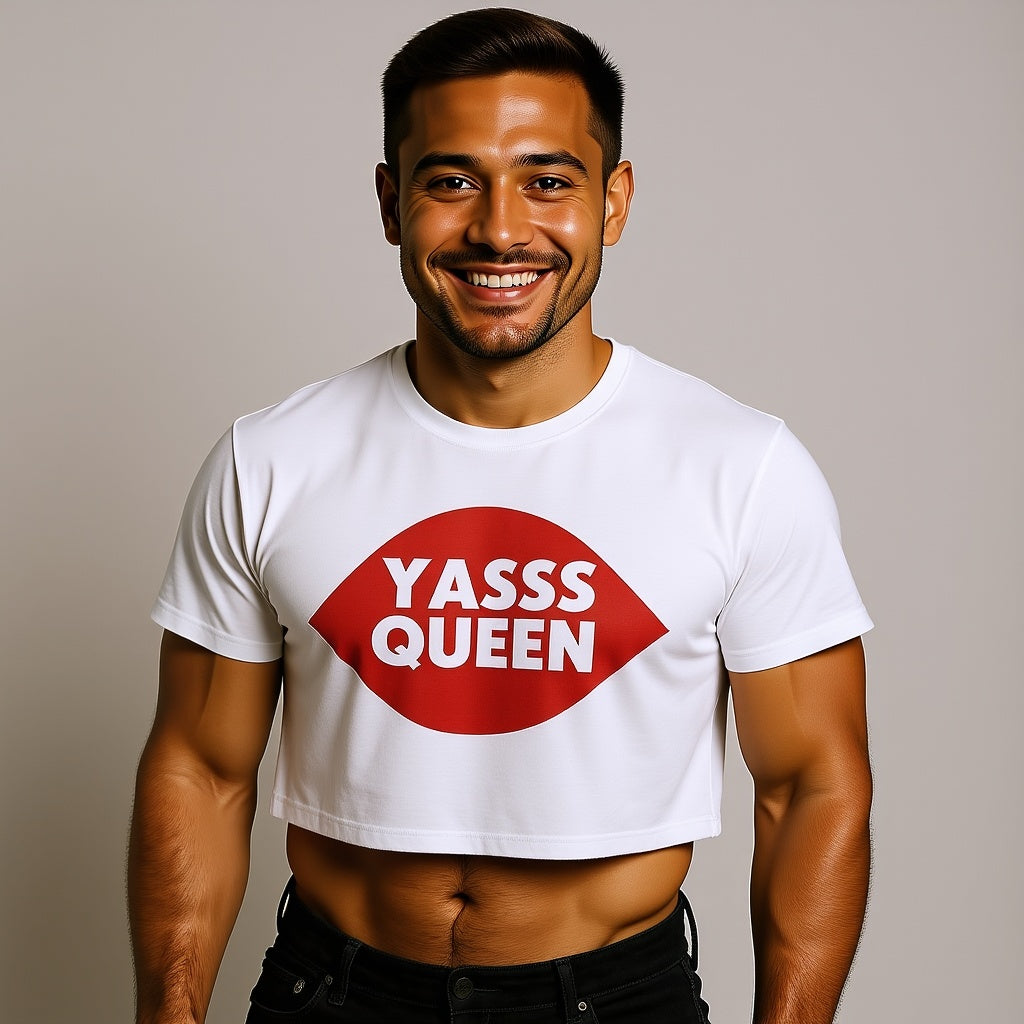 Smiling model wearing a white Yasss Queen crop top with a red lips graphic. LGBTQ+ merch from The Bayou WeHo in West Hollywood, Los Angeles.