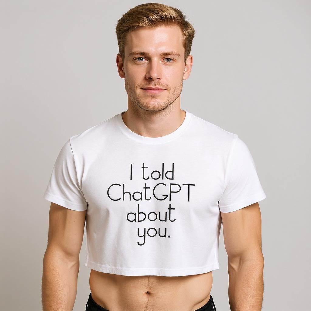Man wearing a white t-shirt with text 'I told ChatGPT about you' on a plain background