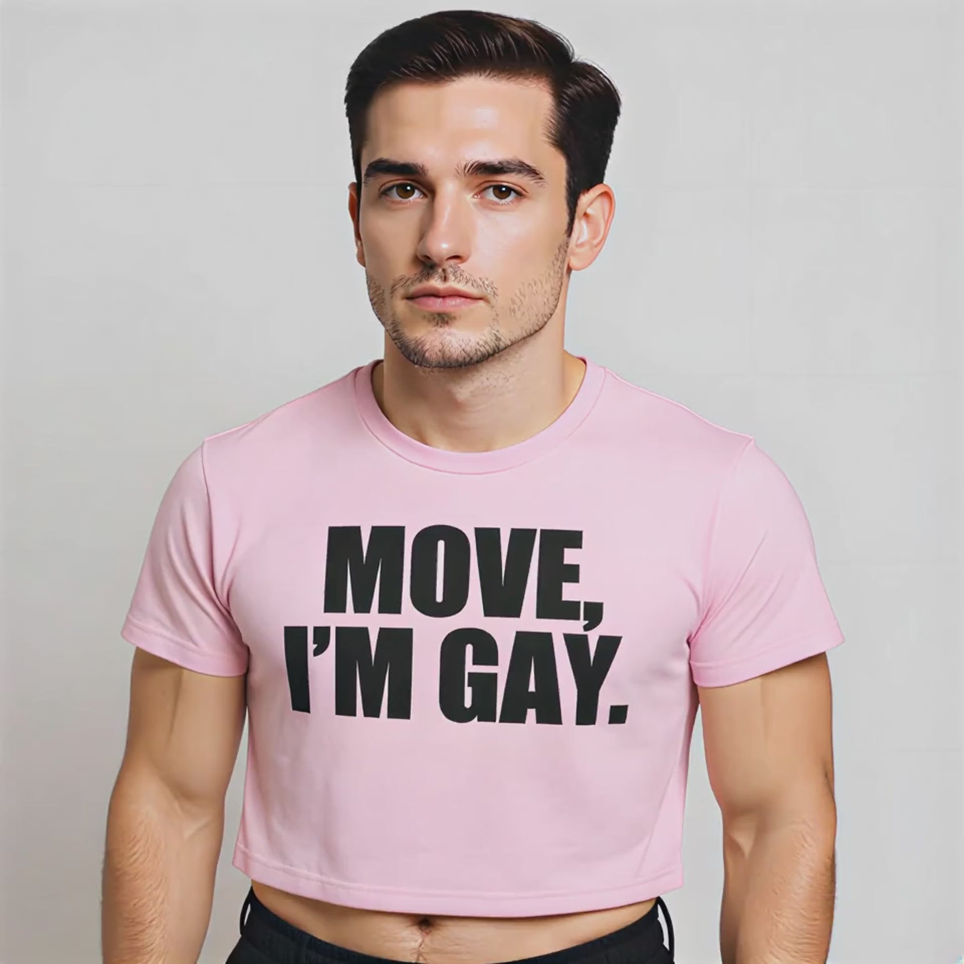 The model is spinning in circles wearing a pink crop top with the words "Move, I'm Gay" on the front in black Impact font lettering.