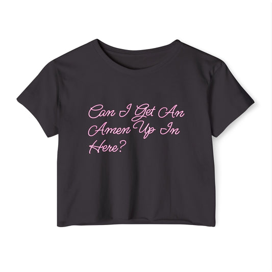 Black t-shirt with pink text saying, "Can I Get an Amen Up In Here?" On a white background in honor of drag culture in the United States