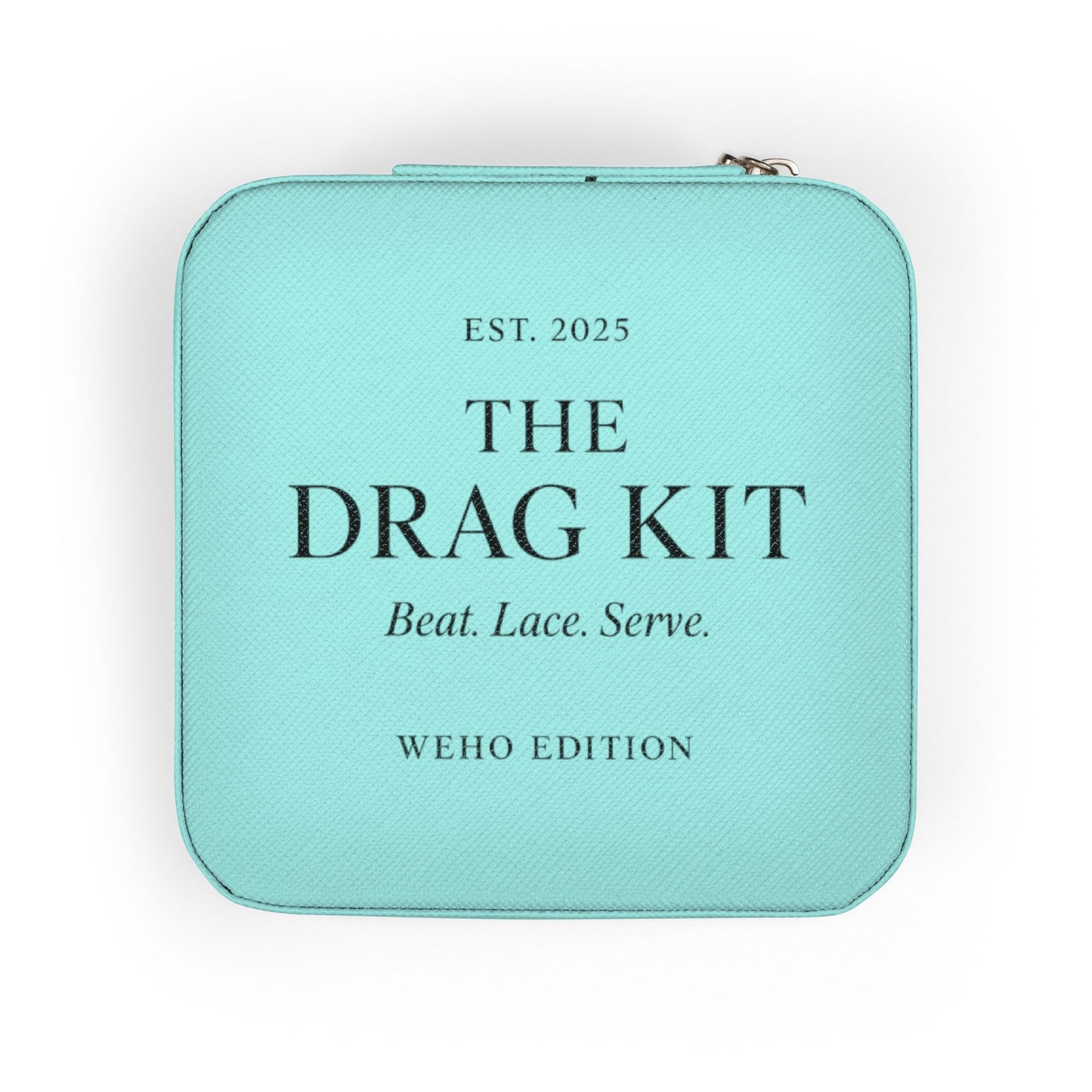 Turquoise case with text 'The Drag Kit' on a white background