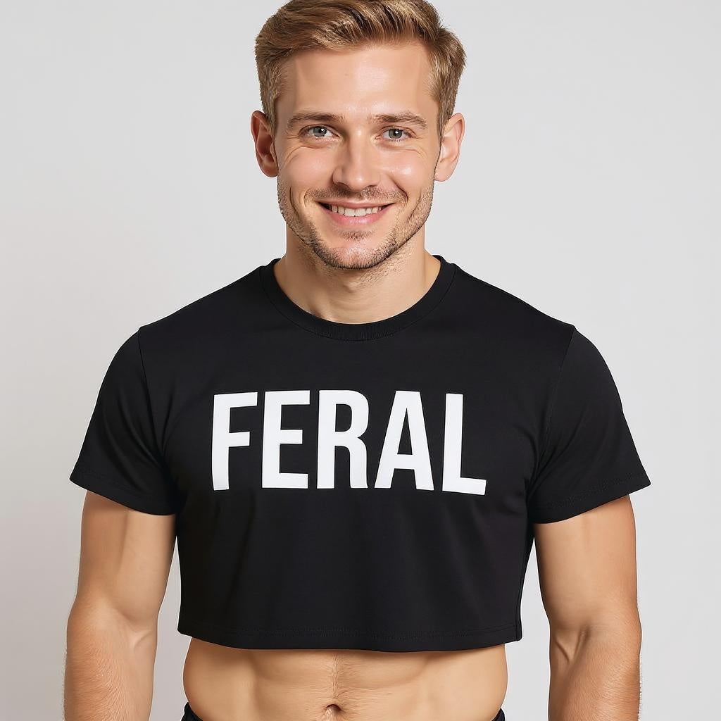 Man wearing a black t-shirt with 'FERAL' text on a plain background