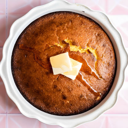 Fresh-baked 6-inch honey butter cornbread drizzled with golden syrup from The Bayou WeHo—sweet, Southern comfort loved by the West Hollywood gay community.