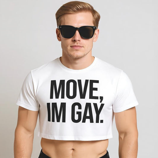 A man wearing black sunglasses and a white cropped T-shirt with bold black text reading “MOVE, I’M GAY” centered on the front.