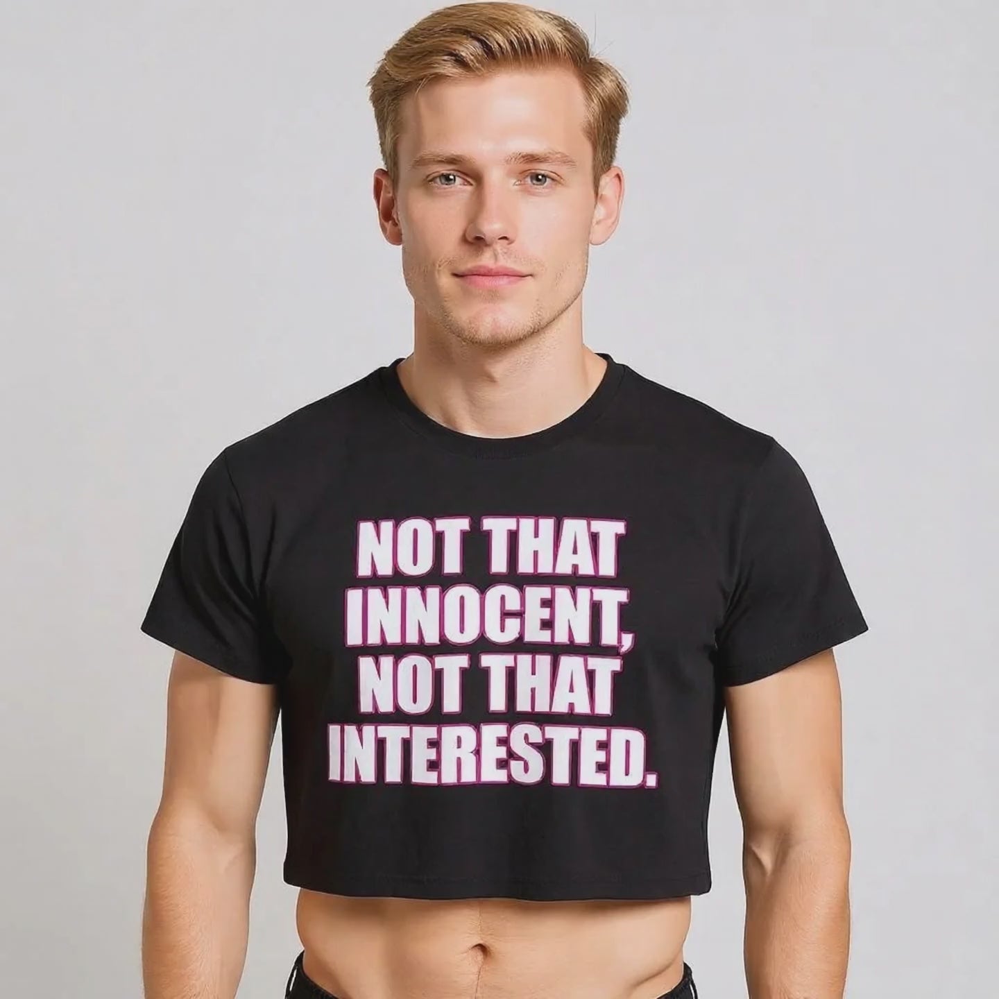 Black crop top with bold “Britney Spears” graphic—retro pop icon style, gender-inclusive fit.