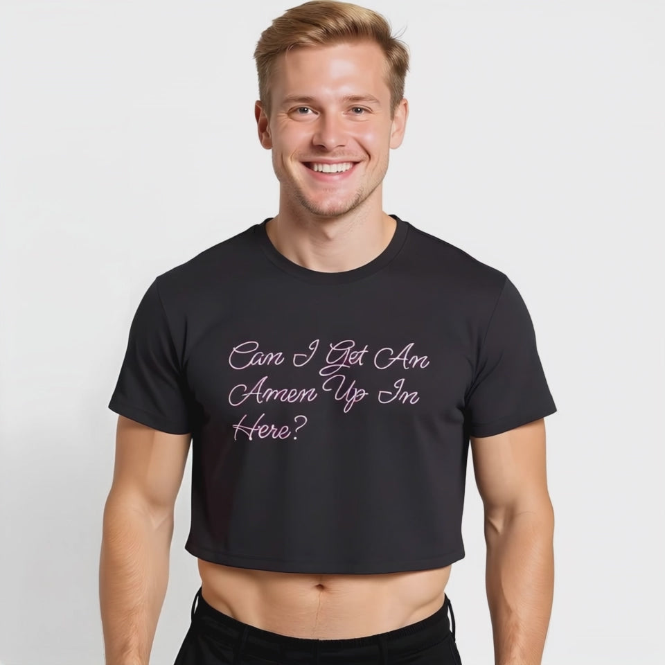 Smiling model wearing a black crop top with pink script that reads “Can I Get An Amen Up In Here?” celebrating queer culture, drag-inspired streetwear, and LGBTQ+ fashion.