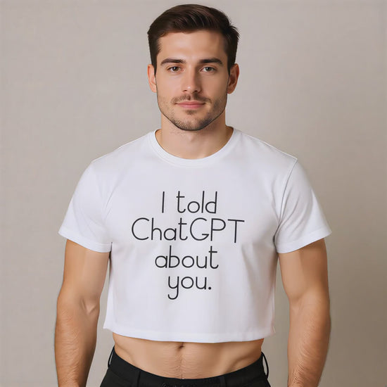 Man spinning wearing a white t-shirt with the text "I told Chat GPT about you" on a plain background